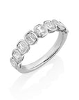 18k white gold band with bezel-set cushion diamonds by Henri Daussi.