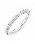 18k white gold band with alternating round and baguette diamonds.