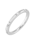 18k white gold band with baguette station diamonds.