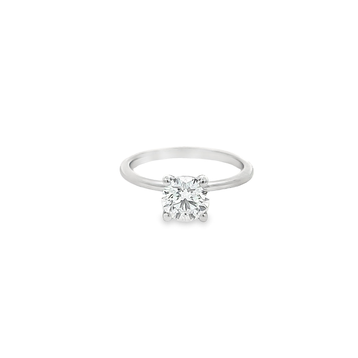 The 1974 18K White Gold Round Solitaire Engagement Ring