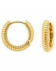 A pair of gold huggie hoop earrings with a textured, ribbed exterior, shown on a plain white background.