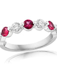 18k white gold band with alternating round rubies and diamonds.