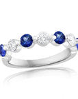 18k white gold band with alternating round blue sapphires and diamonds.
