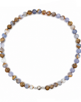 This beaded necklace features a strand of chalcedony stone beads that measure 8mm in diameter each. The 16 inch strand is finished with a sterling silver magnetic ball clasp.