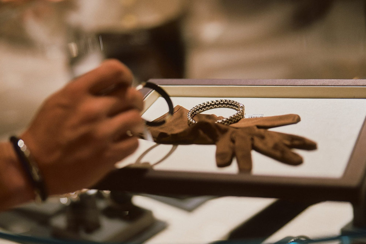 bracelet being examined for appraisal