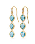 18K yellow gold drop earrings featuring bezel-set, rose-cut round blue topaz gemstones arranged in a continuous line with hook posts set with diamonds. Displayed on a white background.
