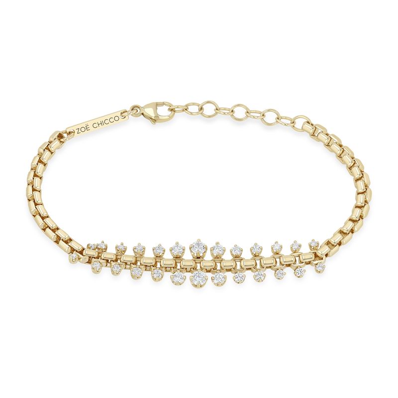 This 14k yellow gold bracelet from Zoe Chicco features graduating prong set diamonds that total 0.80ctw with a box chain that measures 6 inches with an extender chain to 7 inches. Shown on a white background.