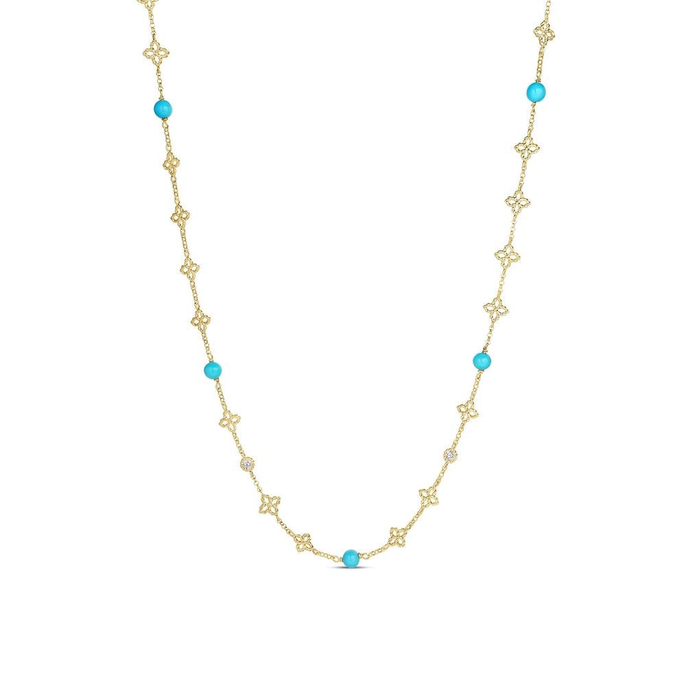 This 18k yellow gold necklace from the Tiny Princess collection by Roberto Coin features a mix of round turquoise stone stations that total 2.70ctw, round bezel set diamond stations that total 0.05ctw, and flower motif stations. The necklace measures 17 inches in total length.
