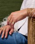 This 14k yellow gold bracelet from Zoe Chicco features graduating prong set diamonds that total 0.80ctw with a box chain that measures 6 inches with an extender chain to 7 inches.