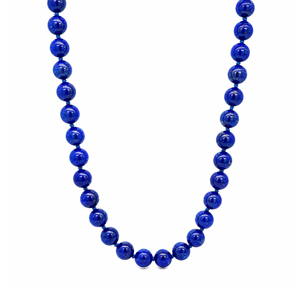 This necklace features lapis beads that measure 8mm in diameter each. This 18 inches strand is finished with a sterling silver magnetic clasp.