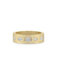 This 14k yellow gold ring from Zoe Chicco features a matte cigar band design with pear, marquise, princess, baguette, and round diamonds that total 0.42ctw. This ring measures 6.5.