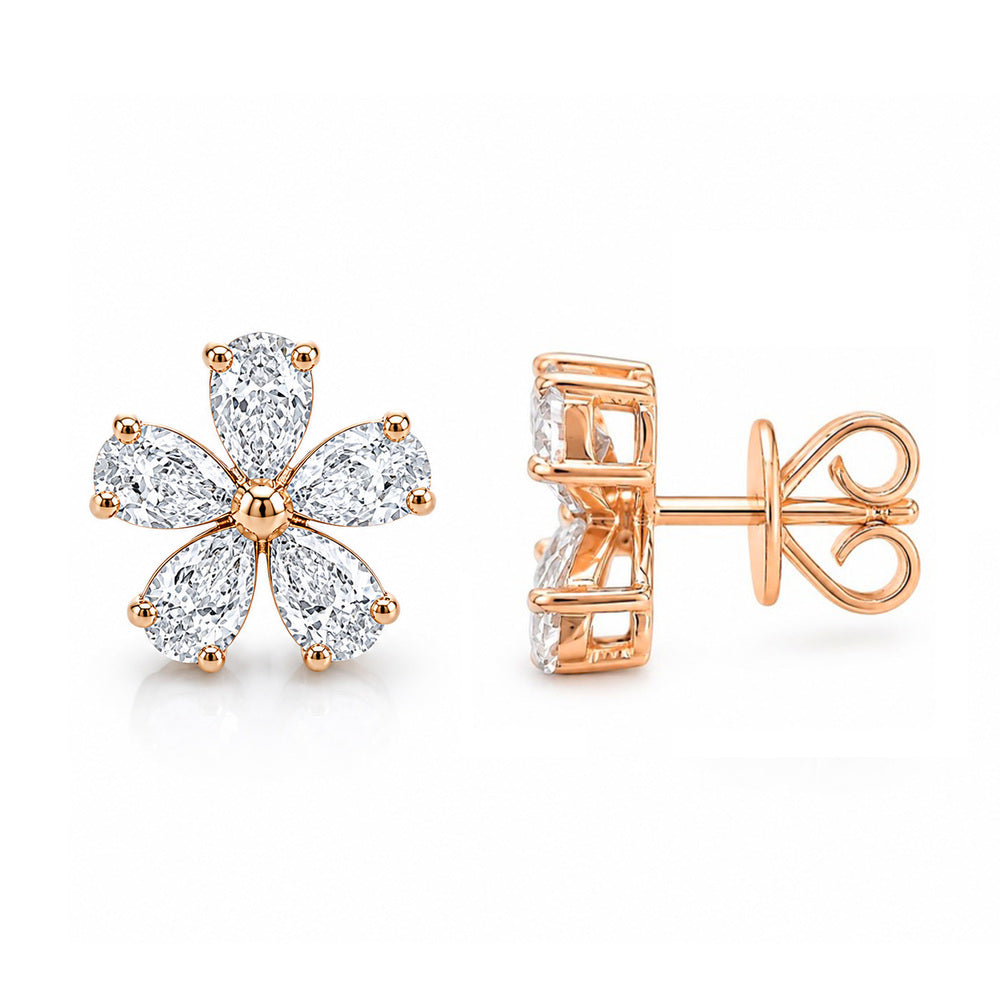 These 18k rose gold stud earrings feature 10 pear shaped diamonds set in the shape of a flower that total 2.38ctw.