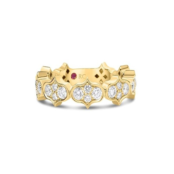 This 18k yellow gold ring from the Cobra collection by Roberto Coin features a row of diamonds that total 0.75ctw.