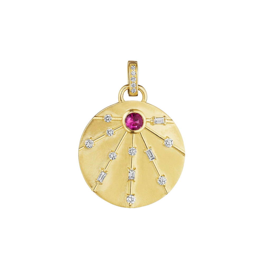 This 18K yellow gold round pendant from Penny Preville features a single round pink sapphire totaling 0.35ctw, accented by round and emerald-cut diamonds totaling 0.45ctw. The pendant is finished with a bail, allowing it to be attached to different necklaces.