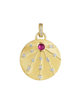 This 18K yellow gold round pendant from Penny Preville features a single round pink sapphire totaling 0.35ctw, accented by round and emerald-cut diamonds totaling 0.45ctw. The pendant is finished with a bail, allowing it to be attached to different necklaces.