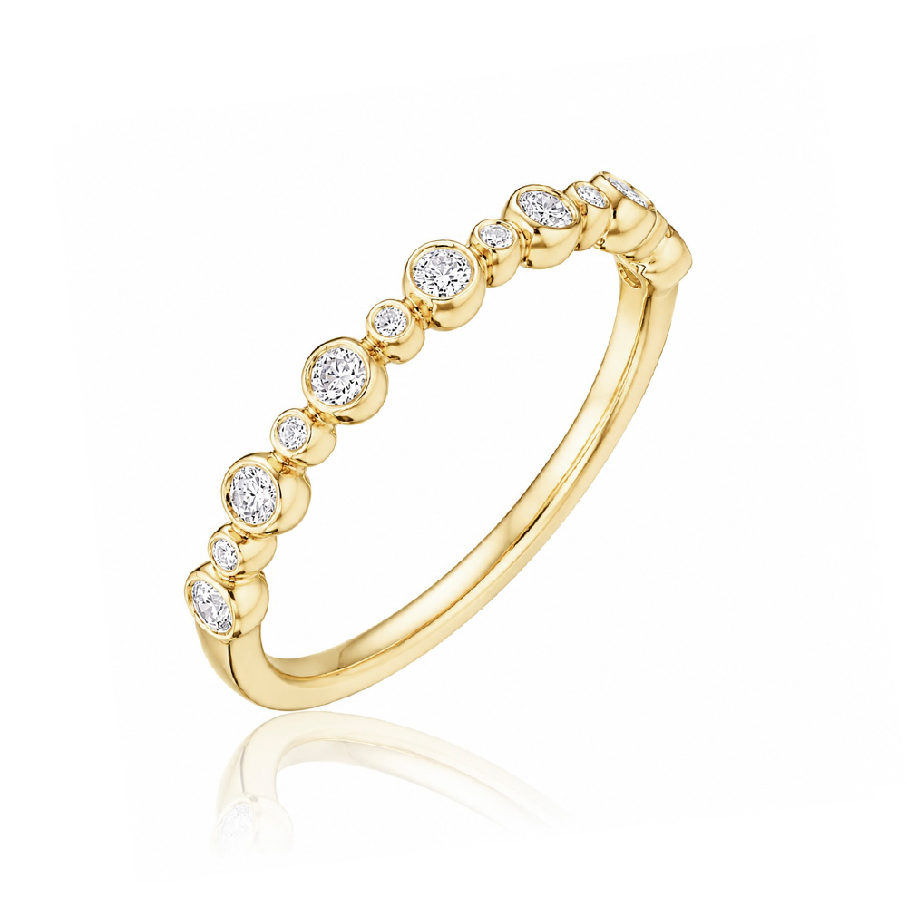 18k yellow gold band with bezel-set round diamonds by Henri Daussi.
