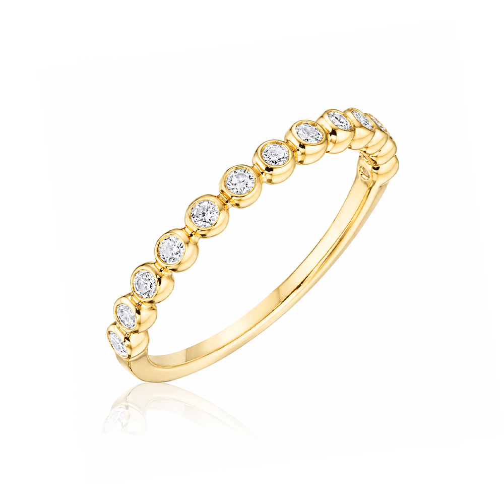 18k yellow gold band with bezel-set round diamonds by Henri Daussi.
