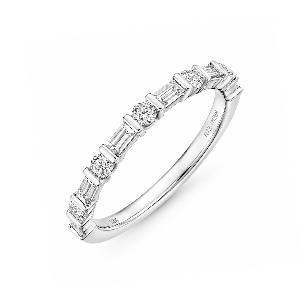 18k white gold band with alternating round and baguette diamonds.