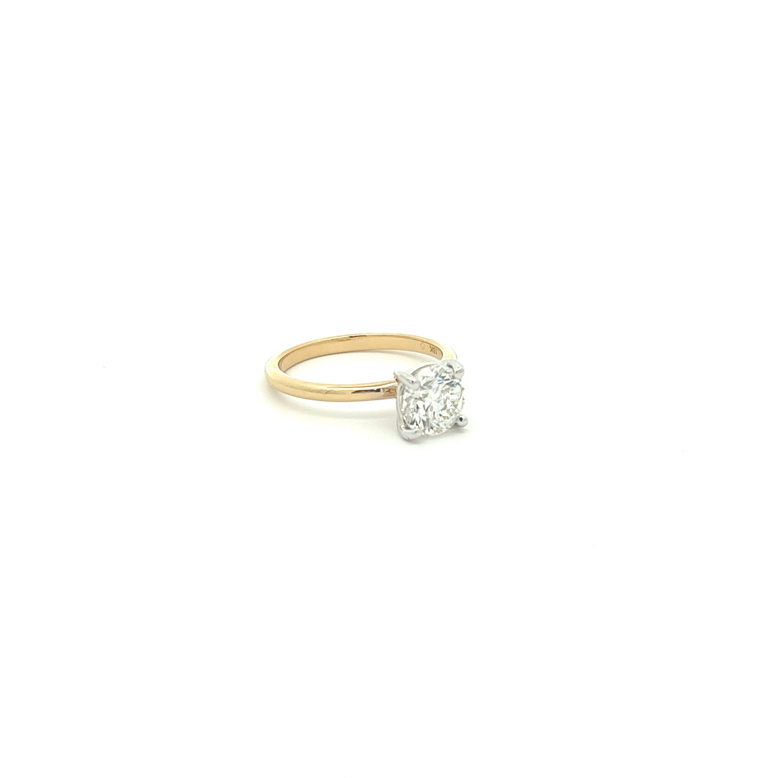 The 1974 18K Yellow Gold Round Engagement Ring