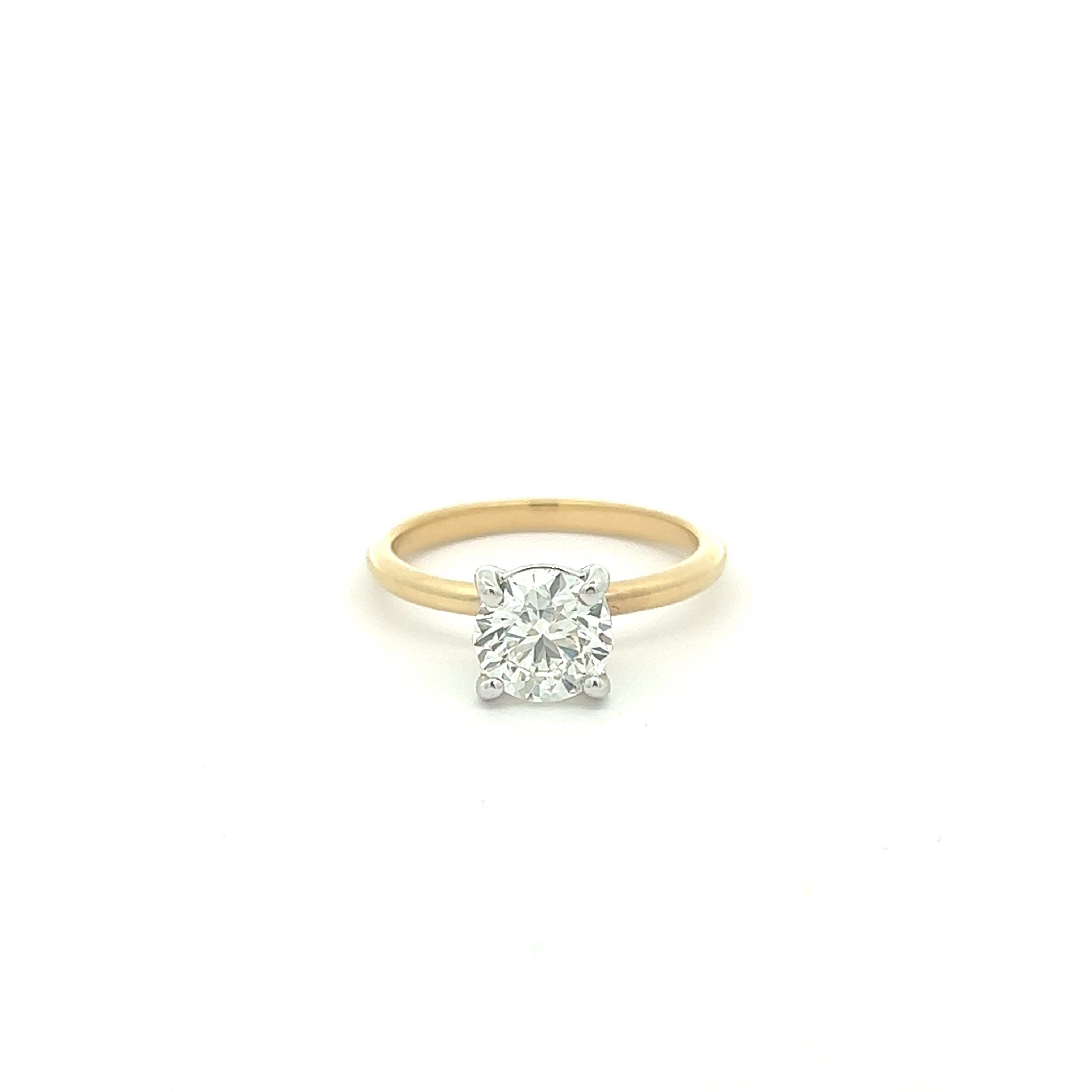 The 1974 18K Yellow Gold Round Engagement Ring