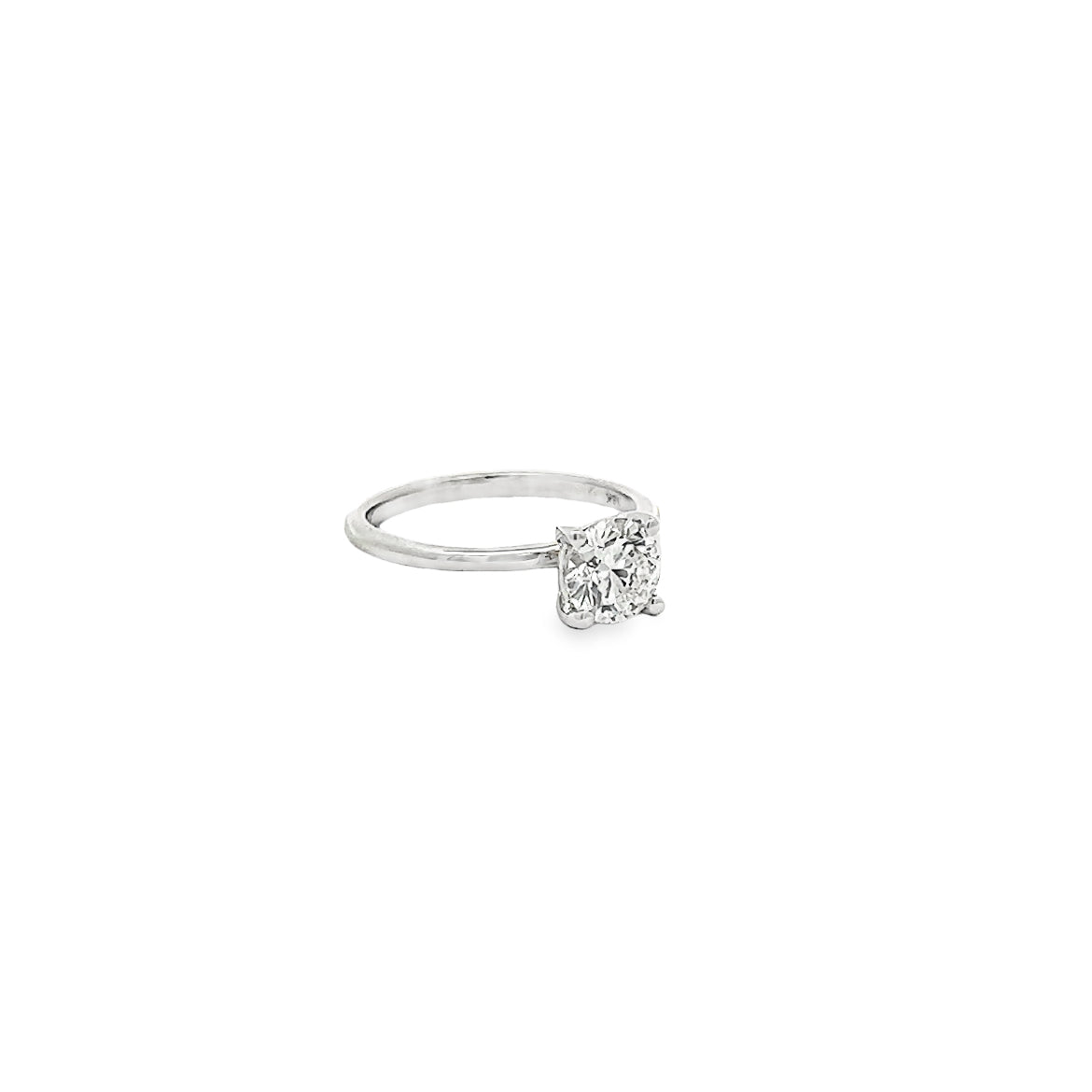 The 1974 18K White Gold Round Solitaire Engagement Ring