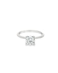 The 1974 18K White Gold Round Solitaire Engagement Ring