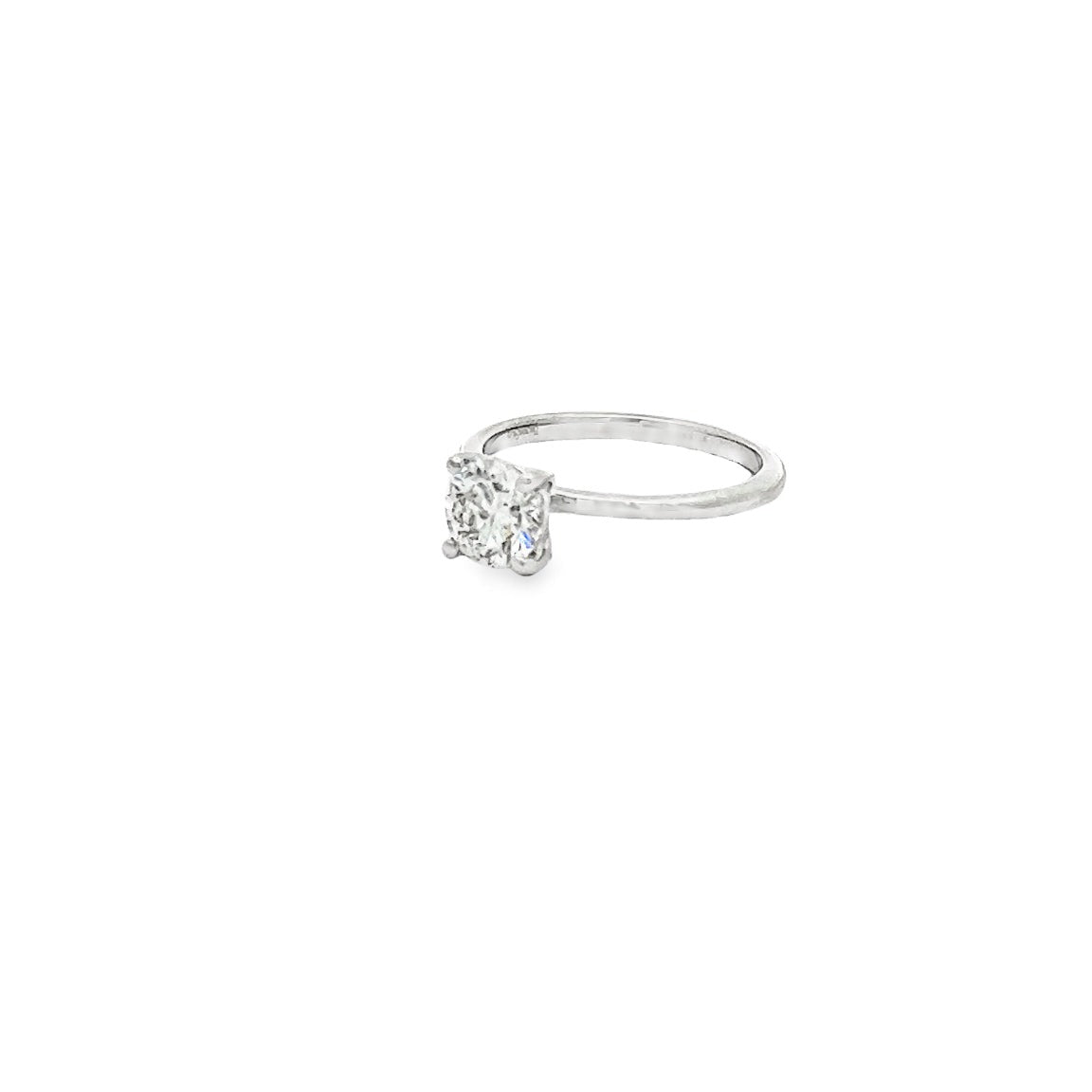The 1974 18K White Gold Round Solitaire Engagement Ring