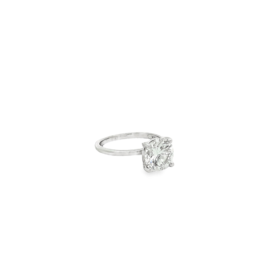 The 1974 18K White Gold Round Engagement Ring