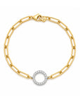18k yellow gold paperclip bracelet with a circular diamond link.