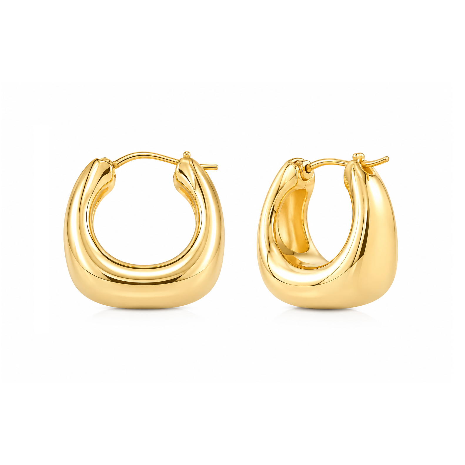 A pair of polished yellow gold hoop earrings with a thick, rounded organic shape, displayed against a clean white background.