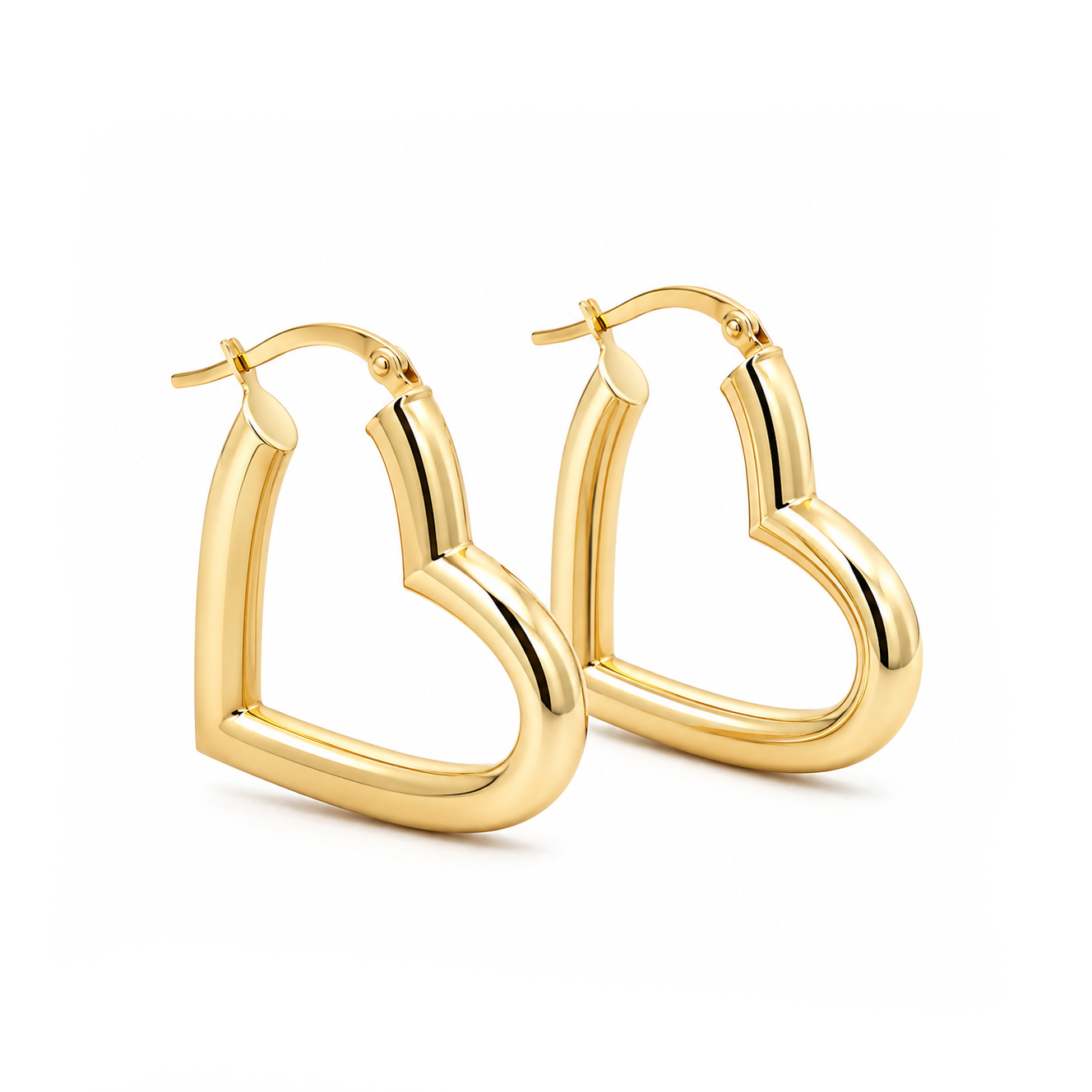 A pair of polished gold heart-shaped hoop earrings on a clean white background.