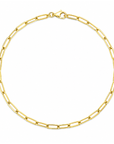 A gold paperclip chain necklace with a lobster clasp, displayed in a circular shape against a plain white background.