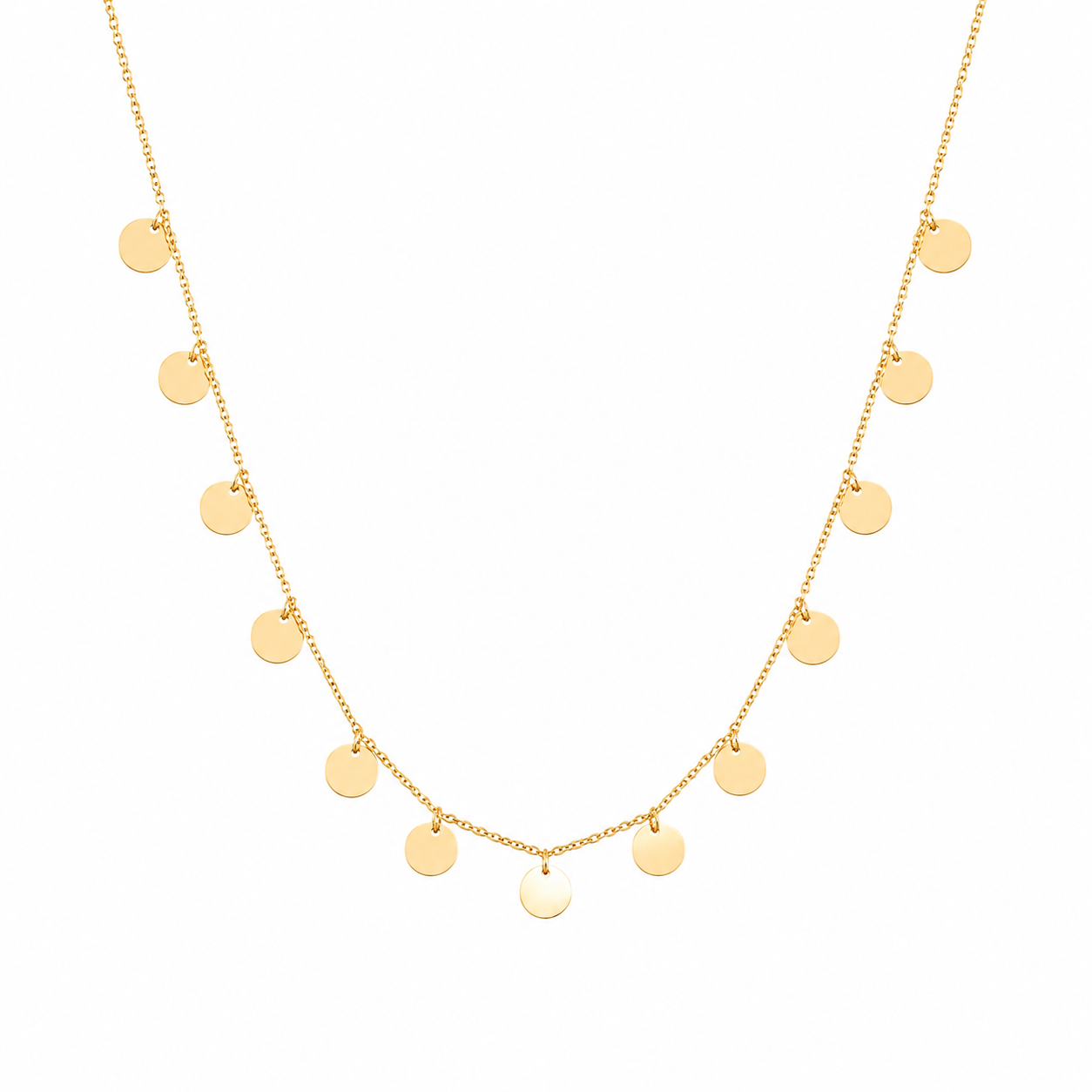 A delicate gold chain necklace featuring multiple small, flat circular disc charms hanging along the chain, photographed against a solid white background.