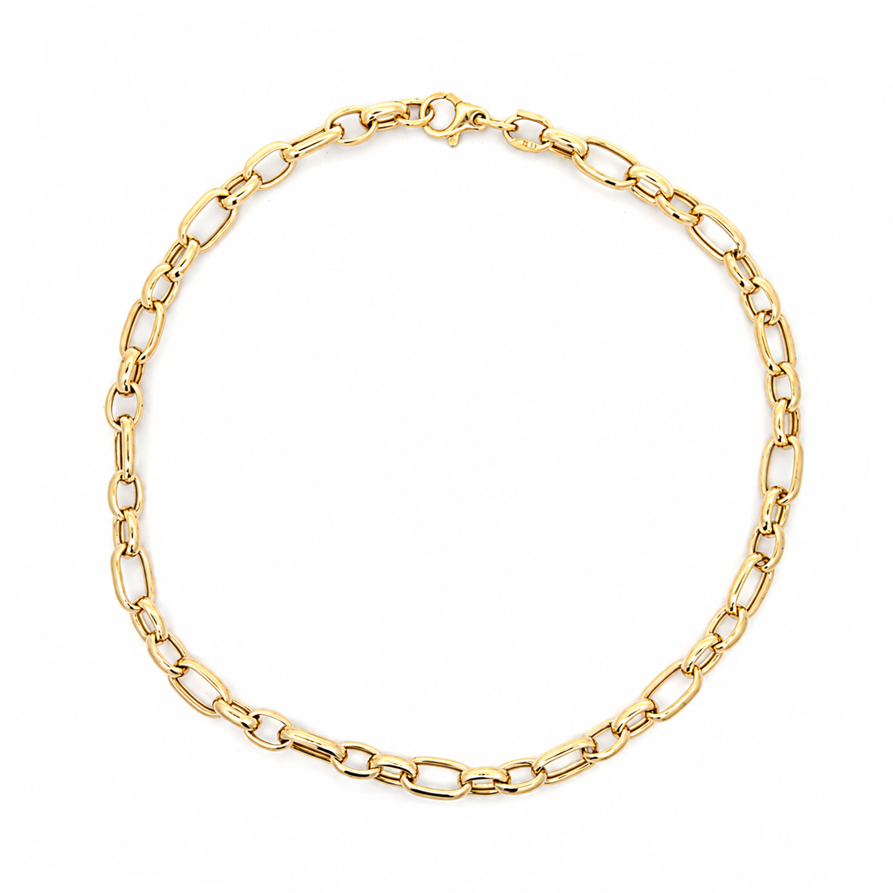A gold Figaro chain necklace with elongated oval links, displayed in a circular shape against a plain white background.