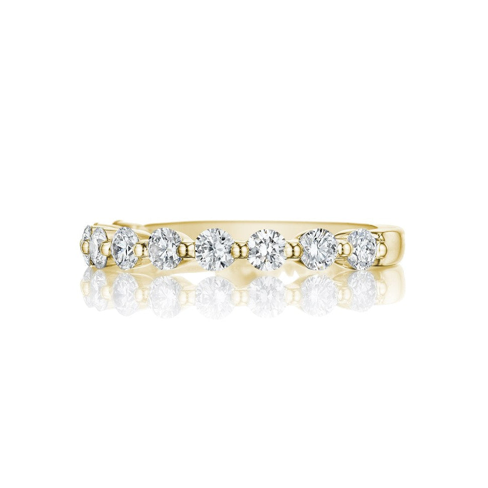 18k yellow gold band with round diamonds.
