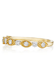 18k yellow gold band with marquise and round diamonds featuring milgrain.