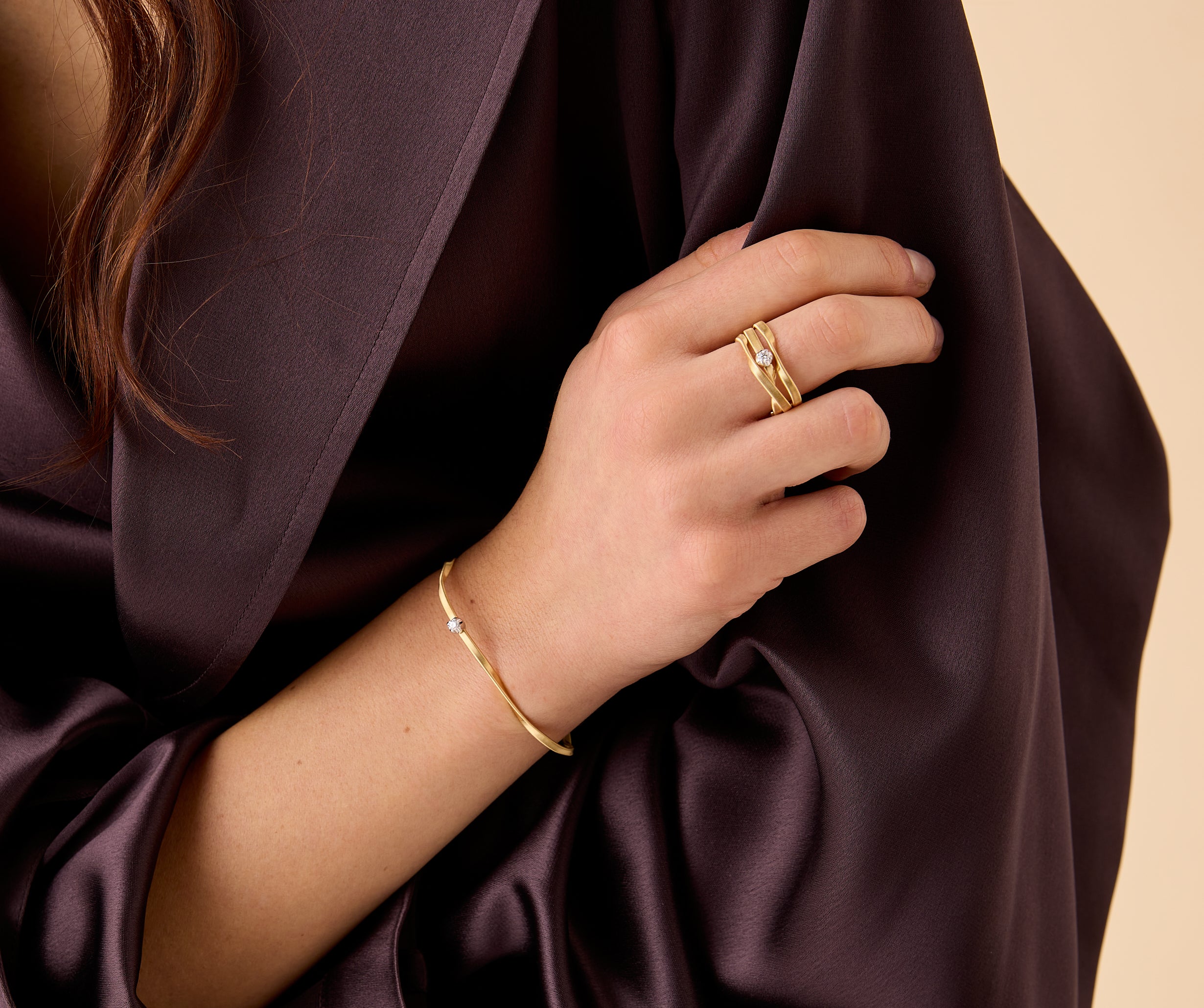 18k Yellow Gold Twisted Coil Bangle with One Diamond Station