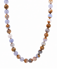 This beaded necklace features a strand of chalcedony stone beads that measure 8mm in diameter each. The 16 inch strand is finished with a sterling silver magnetic ball clasp.
