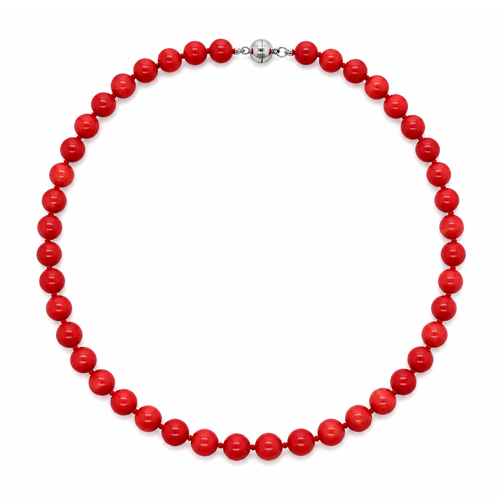 This necklace features red coral beads that measure 8mm in diameter each. The 16 inch strand features a sterling silver magnetic clasp.