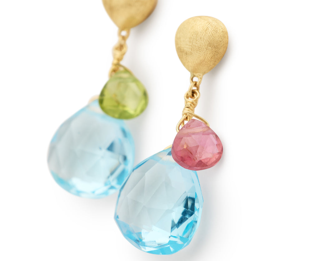Yellow gold earrings with mixed gemstone drops from a hand engraved chain bead stud. On a white background.