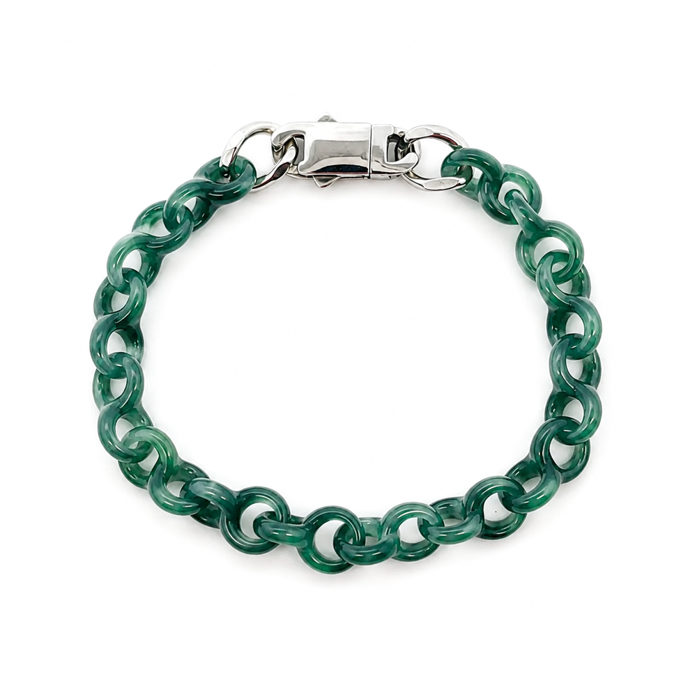 Jade link bracelet with silver clasp on a white background