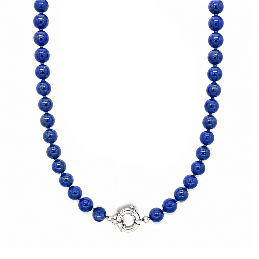 This necklace features lapis beads that measure 8mm in diameter each. This 16 inches strand is finished with a sterling silver charm ring.
