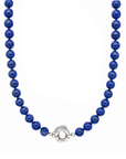 This necklace features lapis beads that measure 8mm in diameter each. This 16 inches strand is finished with a sterling silver charm ring.