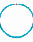 This beaded necklace showcases graduated blue opal gemstones, with the largest stones centered. The strand is finished with a sterling silver magnetic clasp and measures 16 inches. Wear this necklace on its own or as the statement piece for a layered necklace stack.