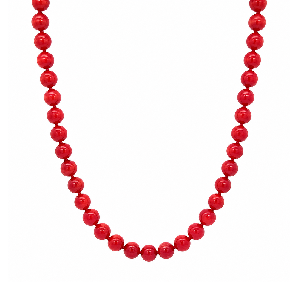 This necklace features red coral beads that measure 8mm in diameter each. The 16 inch strand features a sterling silver magnetic clasp.