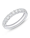 18k white gold half-eternity band with round diamonds.